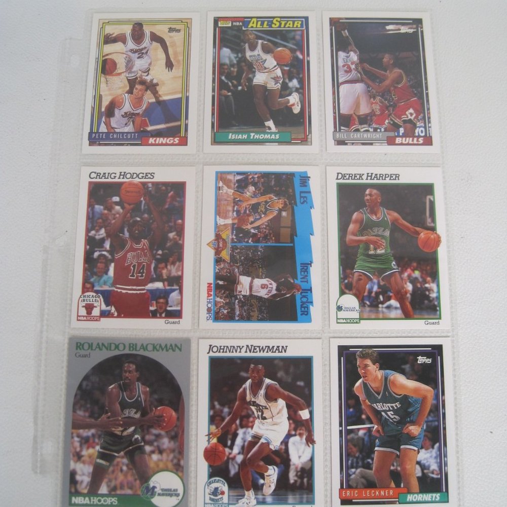 Lot of 9 NBA Players Cards With Binder Sheet